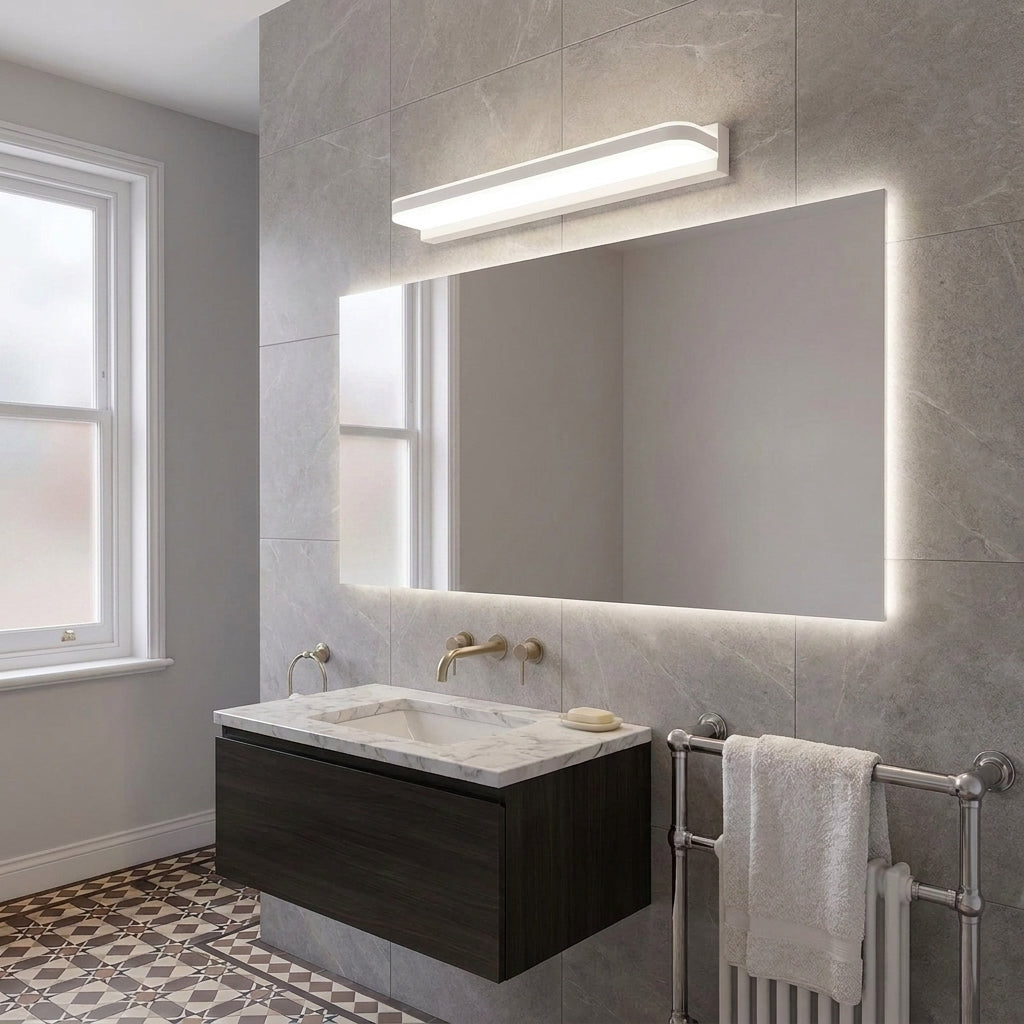 Rymza LED mirror light installed above a bathroom vanity