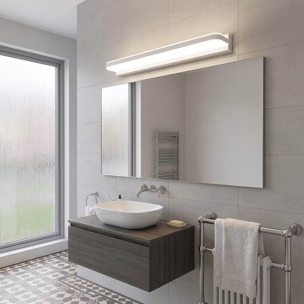 Rymza LED mirror light installed above a bathroom vanity
