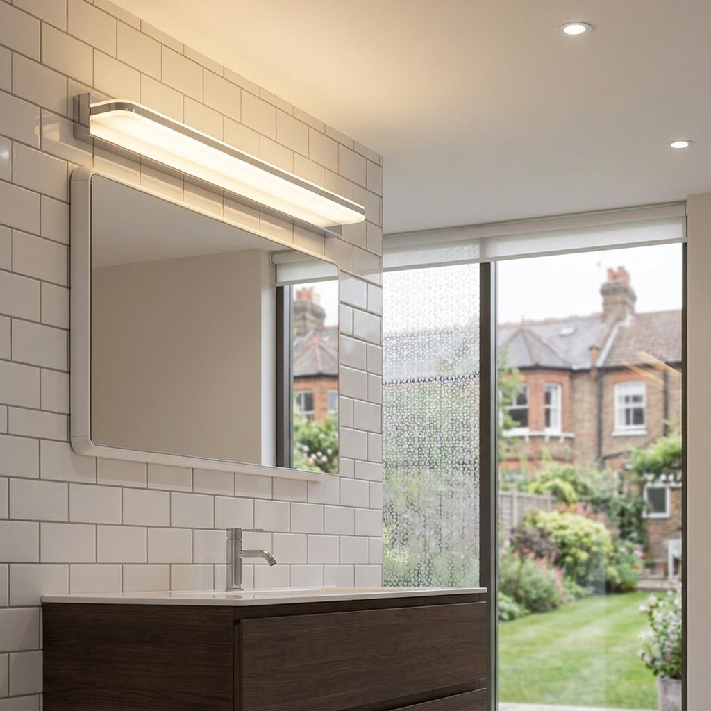 Rymza LED mirror light installed above a bathroom vanity