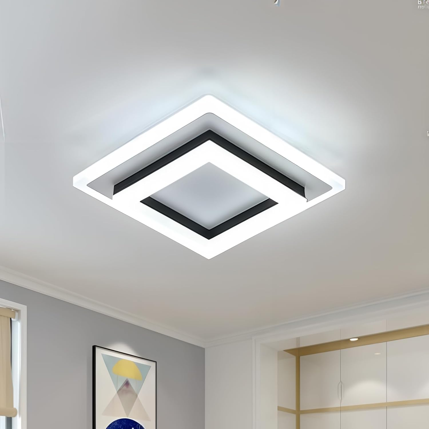 Single black layered square LED flush mount serq ceiling lamp illuminating a modern minimalist room