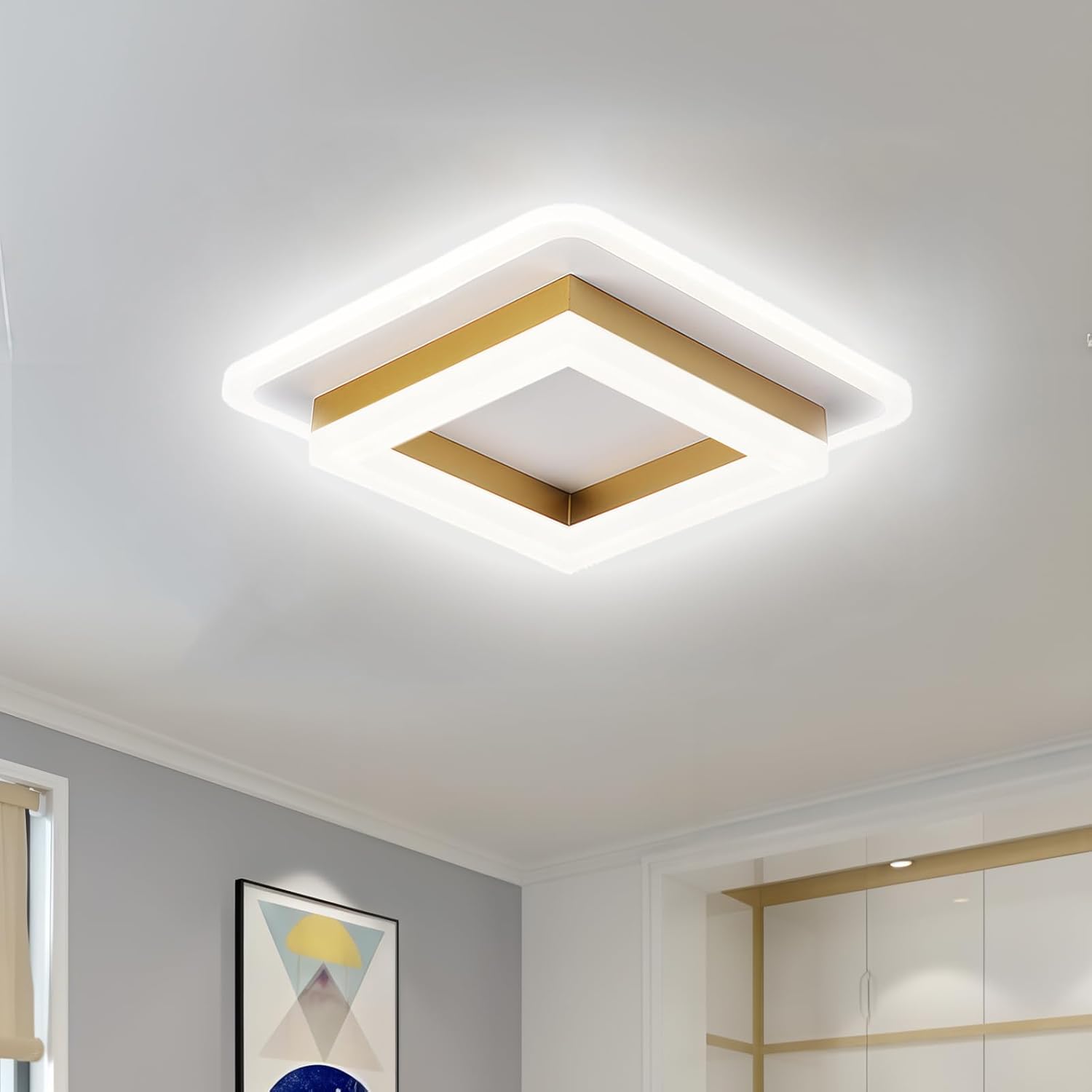 Modern gold geometric square LED flush mount serq ceiling light installed in a bright contemporary room
