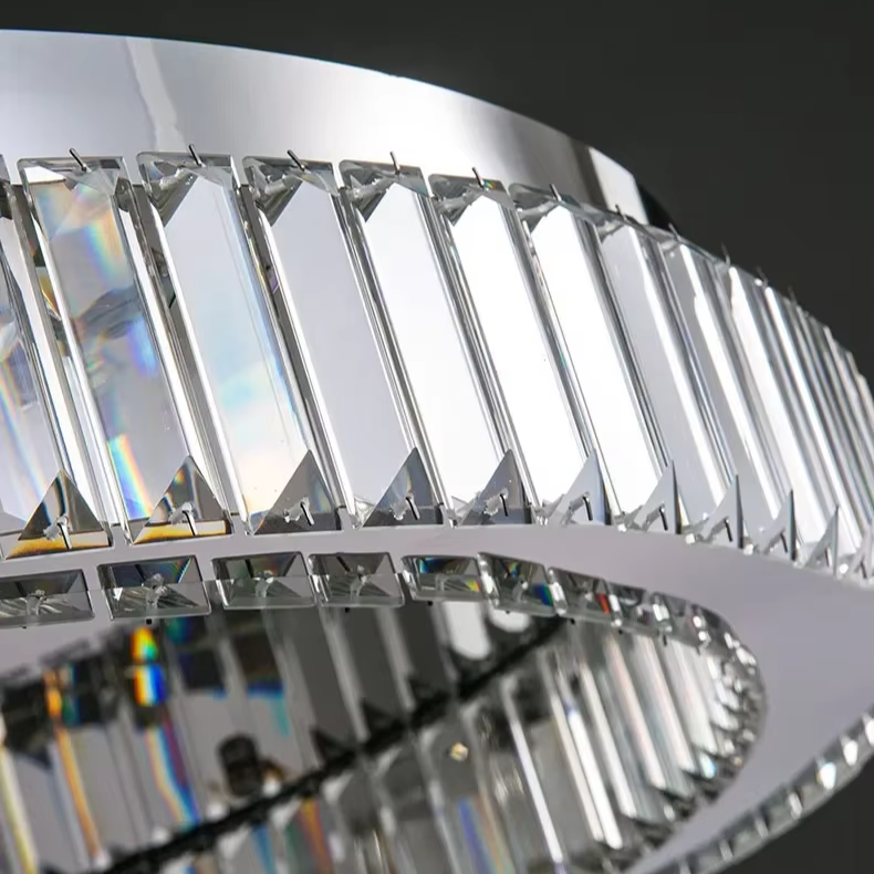 Detailed view of the silver-tone frame and crystal facets on the halo ceiling lamp