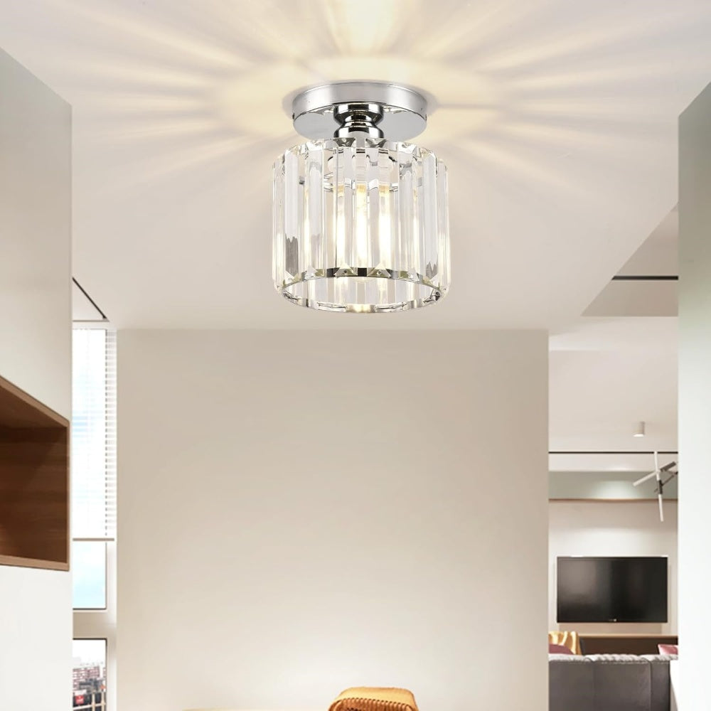 Silver round crystal ceiling fixture adding elegance to a bright, spacious modern room