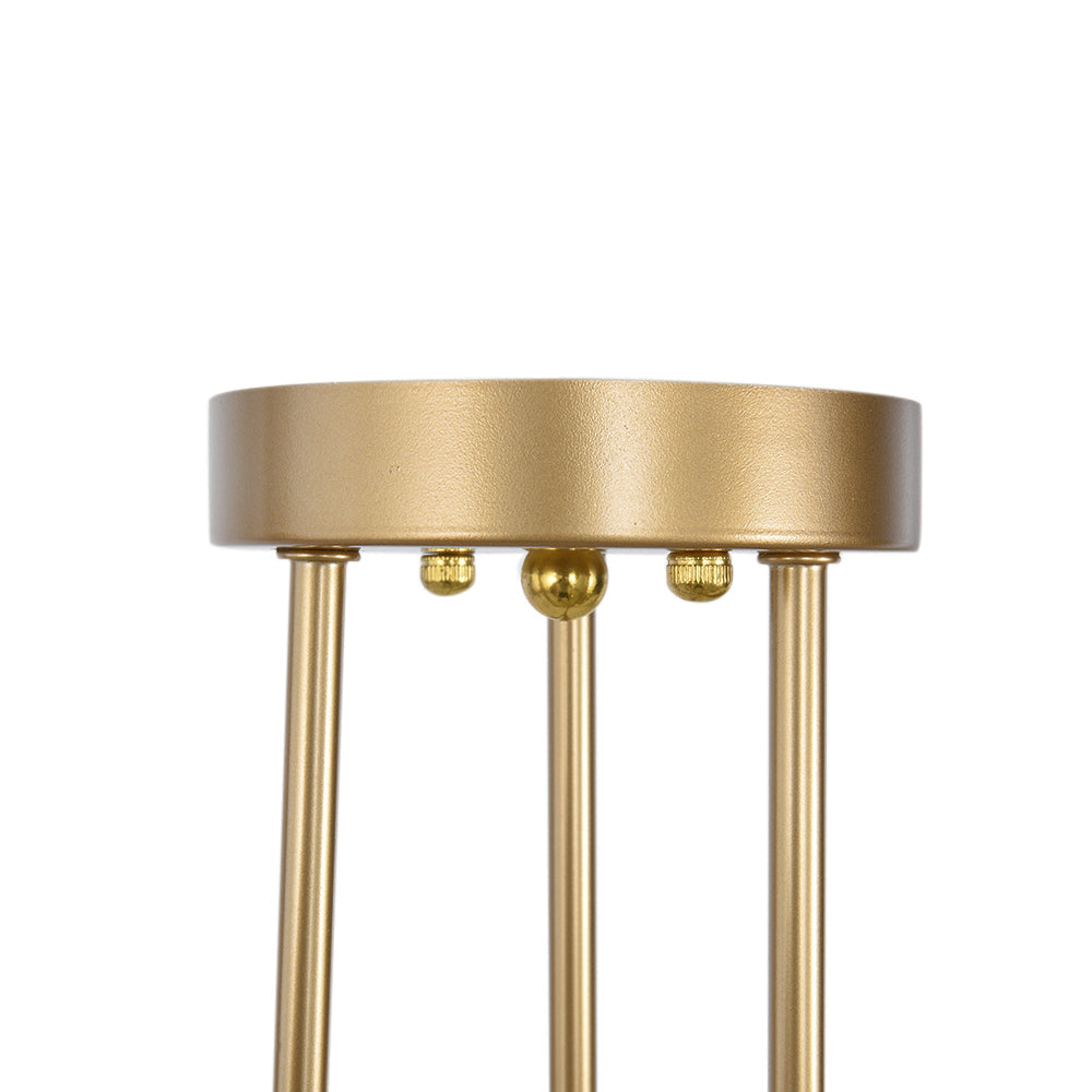 Close-up detail of the brass ceiling canopy featuring a clever swivel joint compatible with sloped and vaulted ceilings