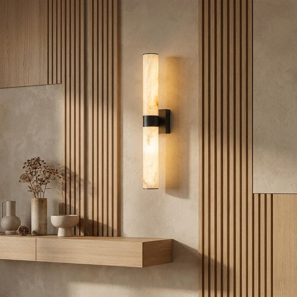 Subxo Black wall sconce mounted on a wall next to some vases