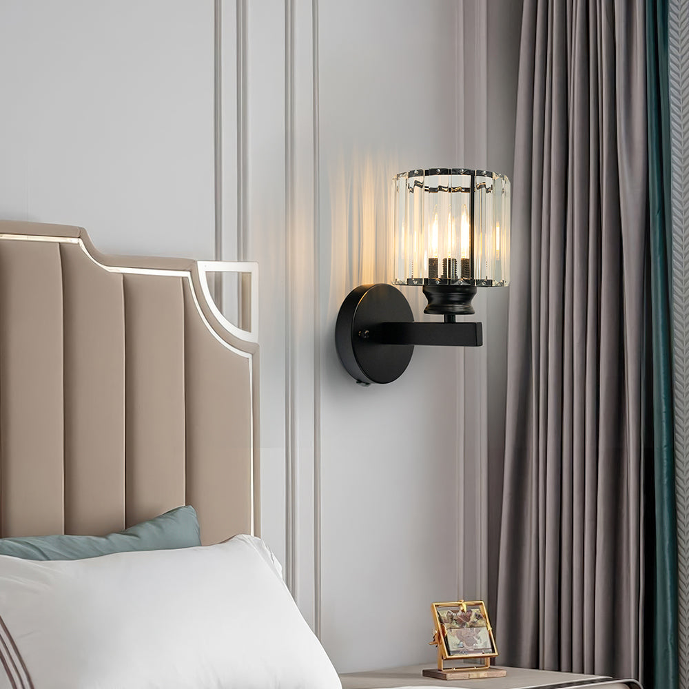 Modern teja black crystal wall lamp illuminating a bright, contemporary bedroom