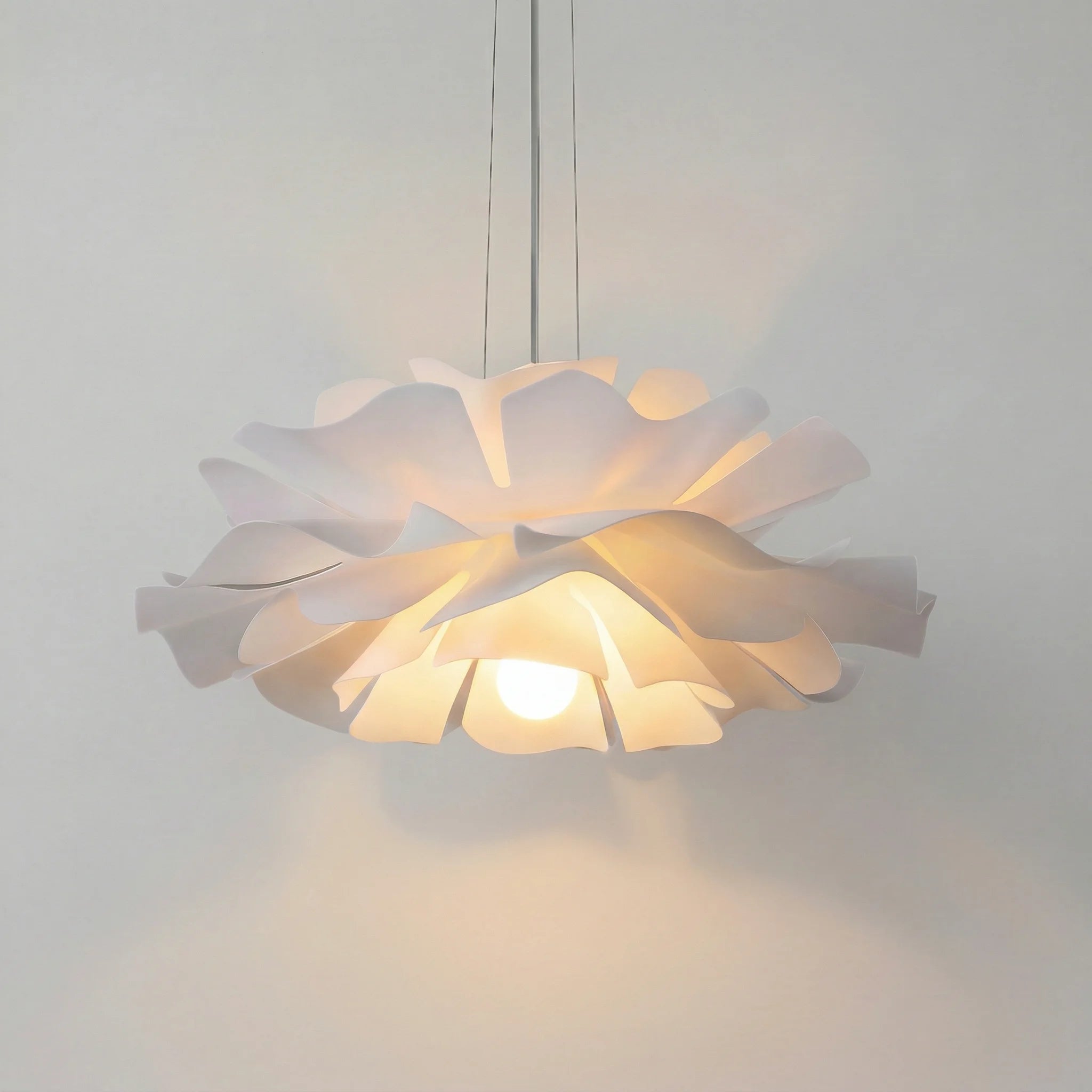 White telba acrylic floral chandelier showcasing its blooming lotus petal design