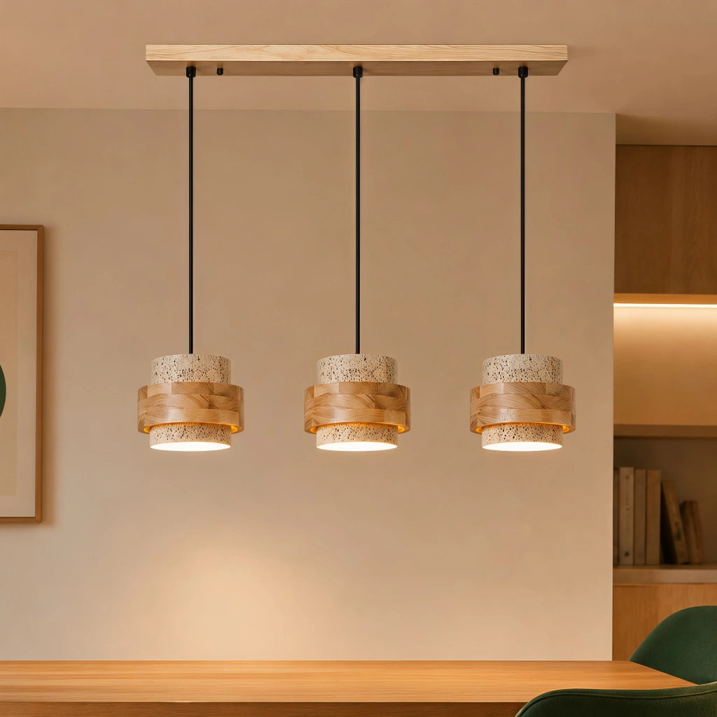 3-head natural wood and travertine pendant hanging over a minimalist dining area