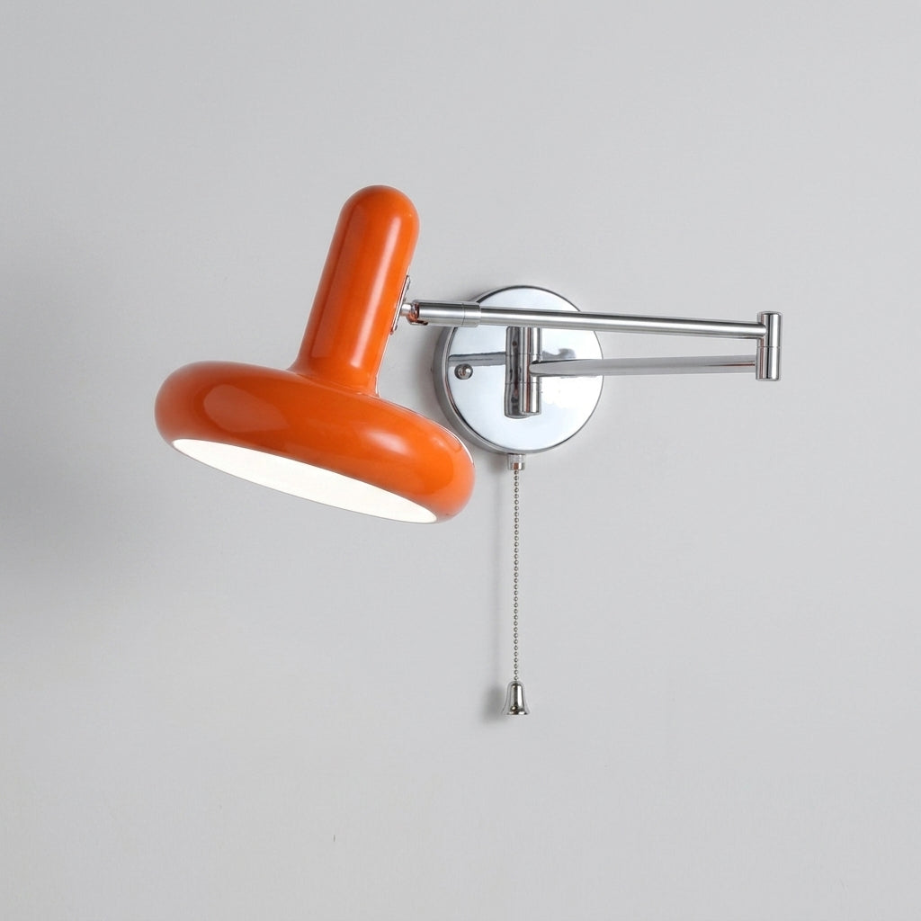 Tolzi wall sconce in orange with pull-cord handle switch, angled studio shot