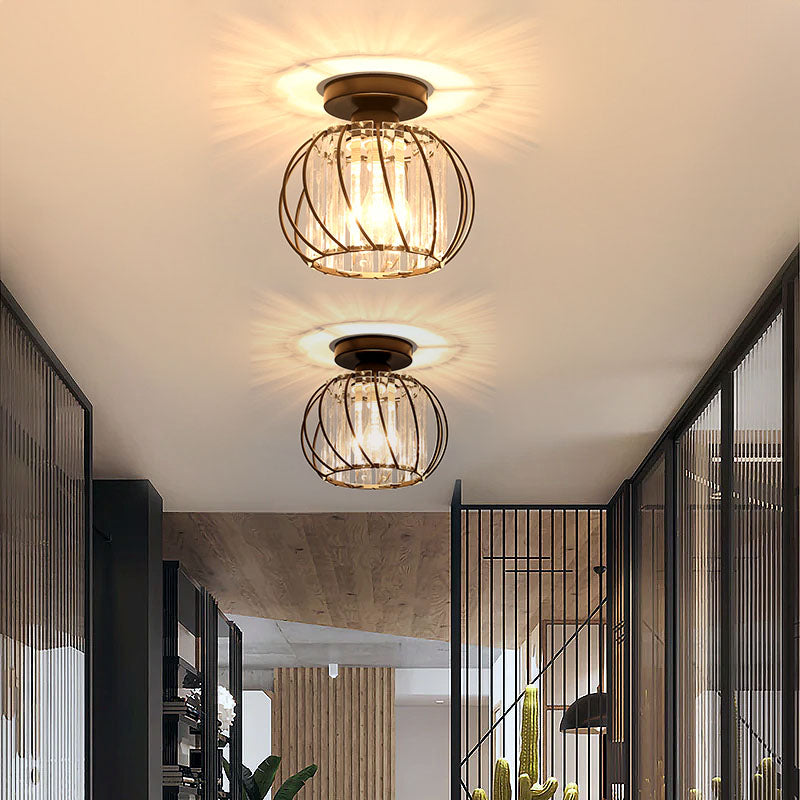 Pair of modern black crystal flush mount ceiling lights illuminating a contemporary corridor