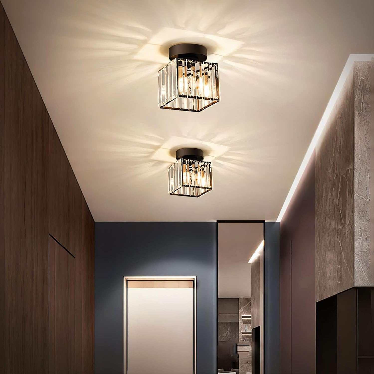 Pair of black square crystal flush ceiling lights in a modern dark blue hallway