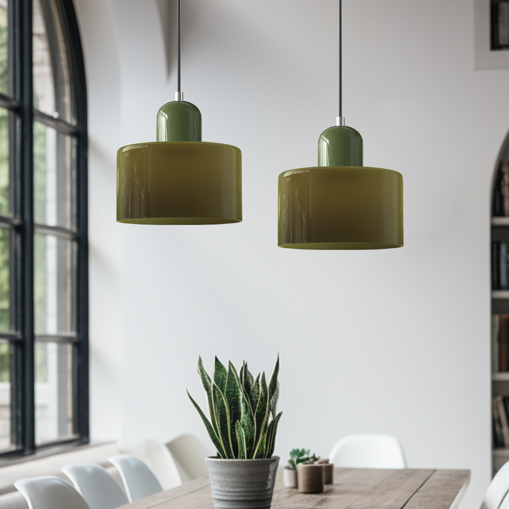 Two green mid-century glass ceiling lamps adding a pop of colour to a neutral modern kitchen