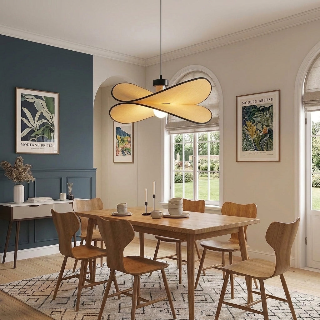 Ujnu dragonfly pendant light in a dining room with a blue wall