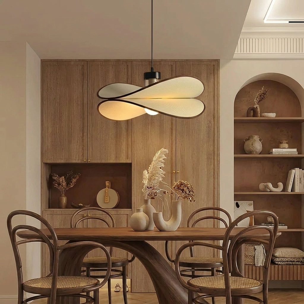 Ujnu dragonfly pendant light above a round dining table