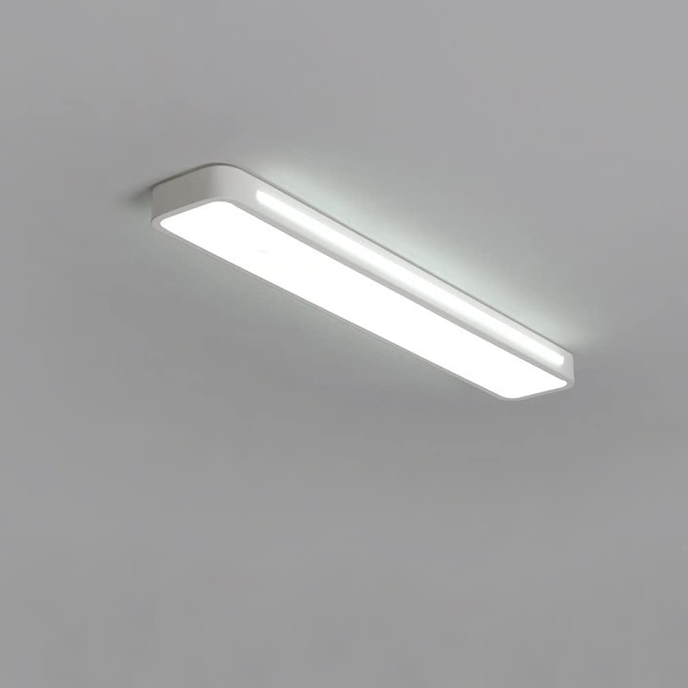 Ultra-thin minimalist white linear LED ceiling light fixture isolated on a grey background