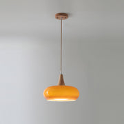 Single orange retro glass dome utul pendant light with a solid wood top