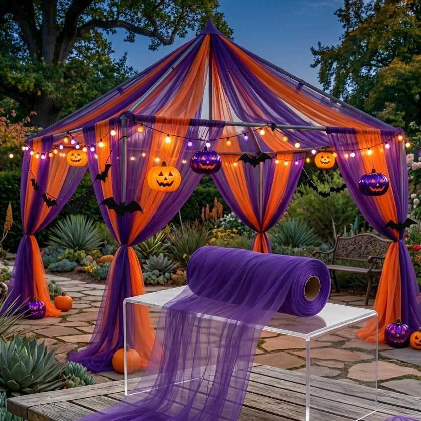 Vampnet purple sheer tulle fabric roll in front of a purple and orange Halloween garden tent with jack-o-lanterns