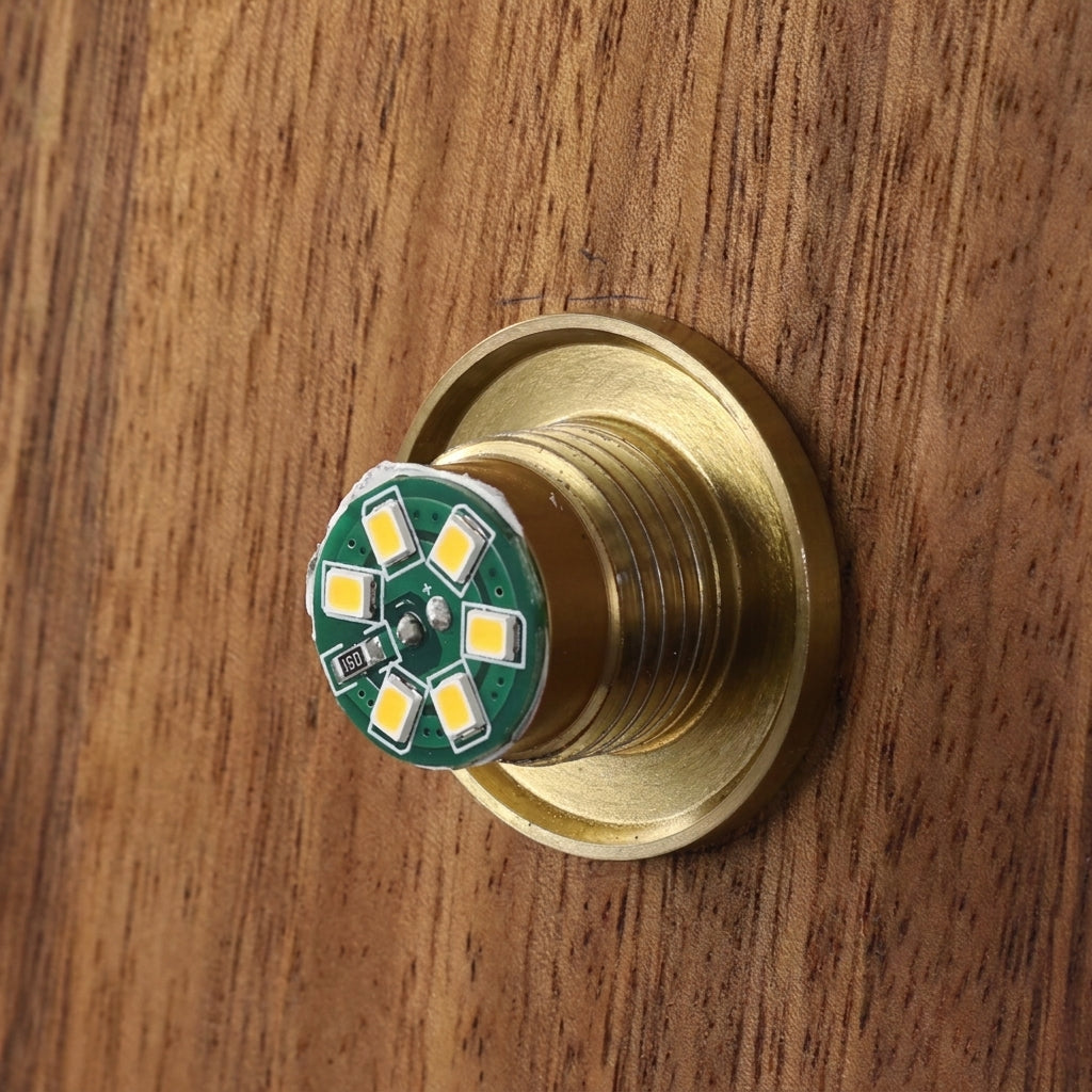 Vebza Japandi orb wall light integrated LED module close-up mounted on the wood backplate