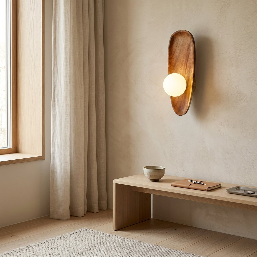 Vebza Japandi orb wall light, Type A, mounted in a living room, lit