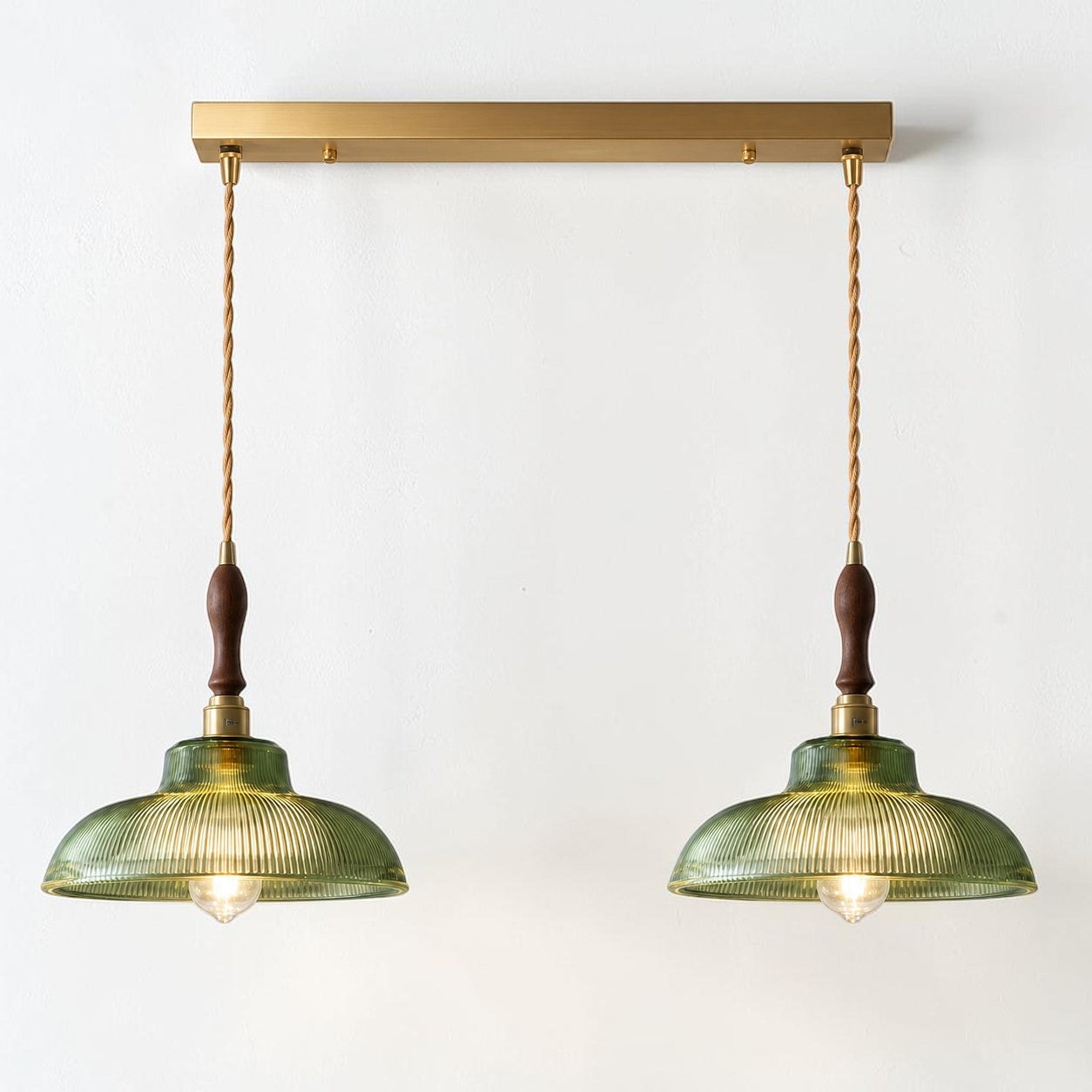 Vopzi 2-Light pendant fixture with brass base and wood handle detail on a white background