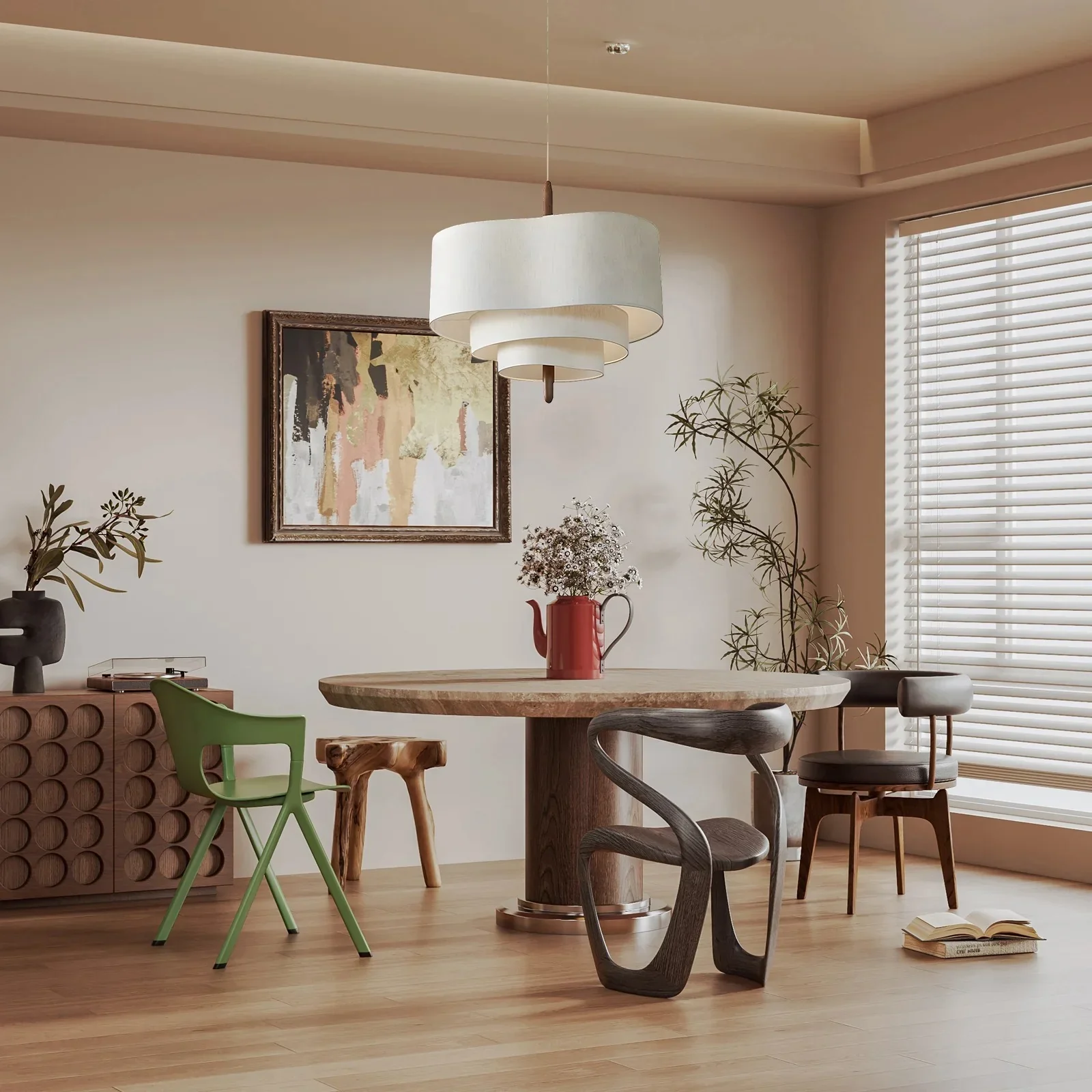 Wabi-Sabi tiered fabric chandelier suspended over a round wooden dining table in a bright Japandi interior