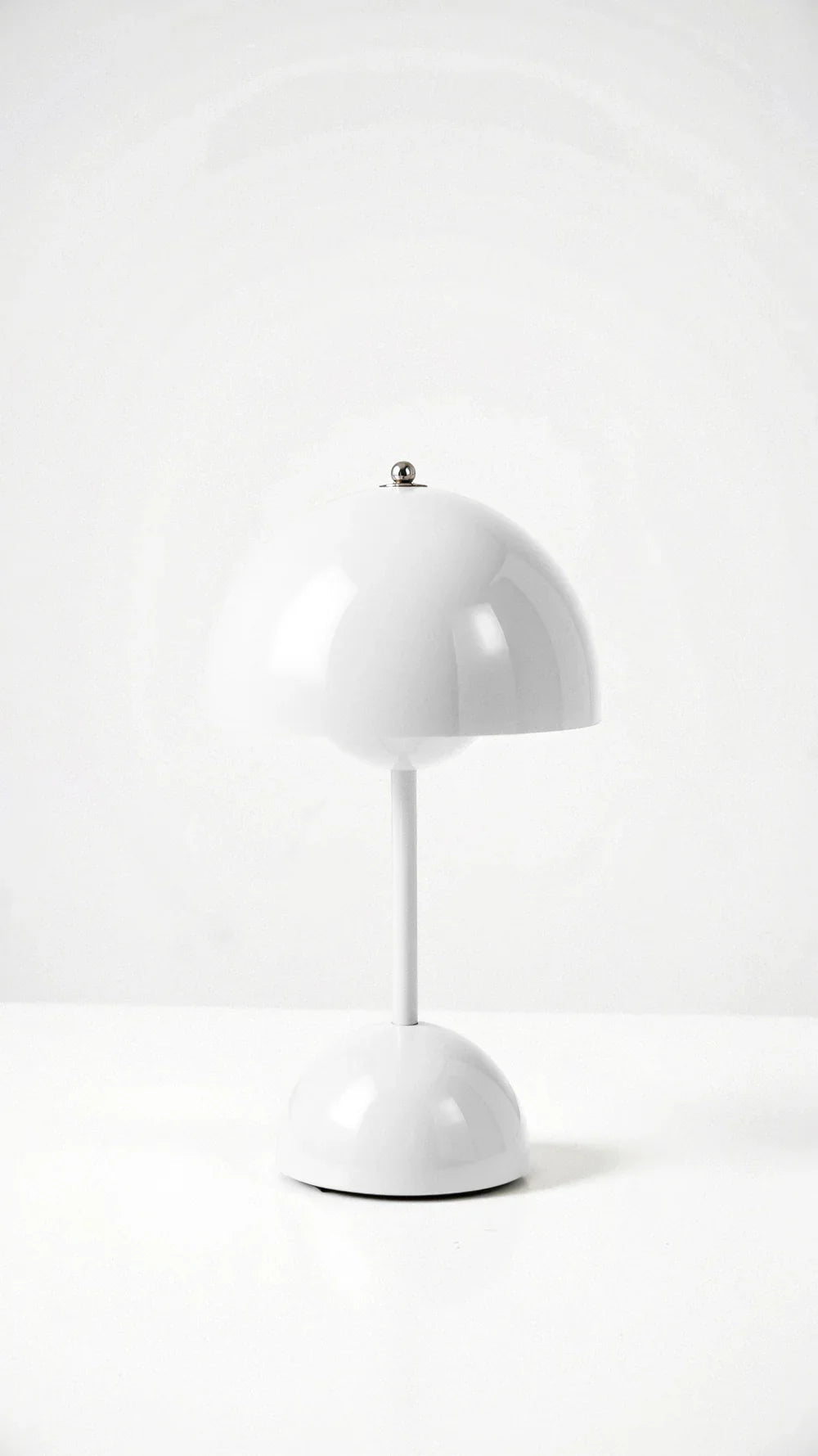 Clean white modern cordless mushroom table lamp showcasing its versatile, neutral aesthetic