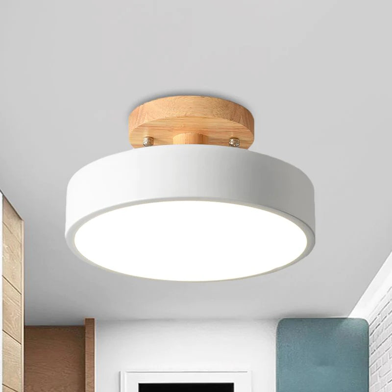 Close-up of the sleek white round wood semi flush mount ceiling light