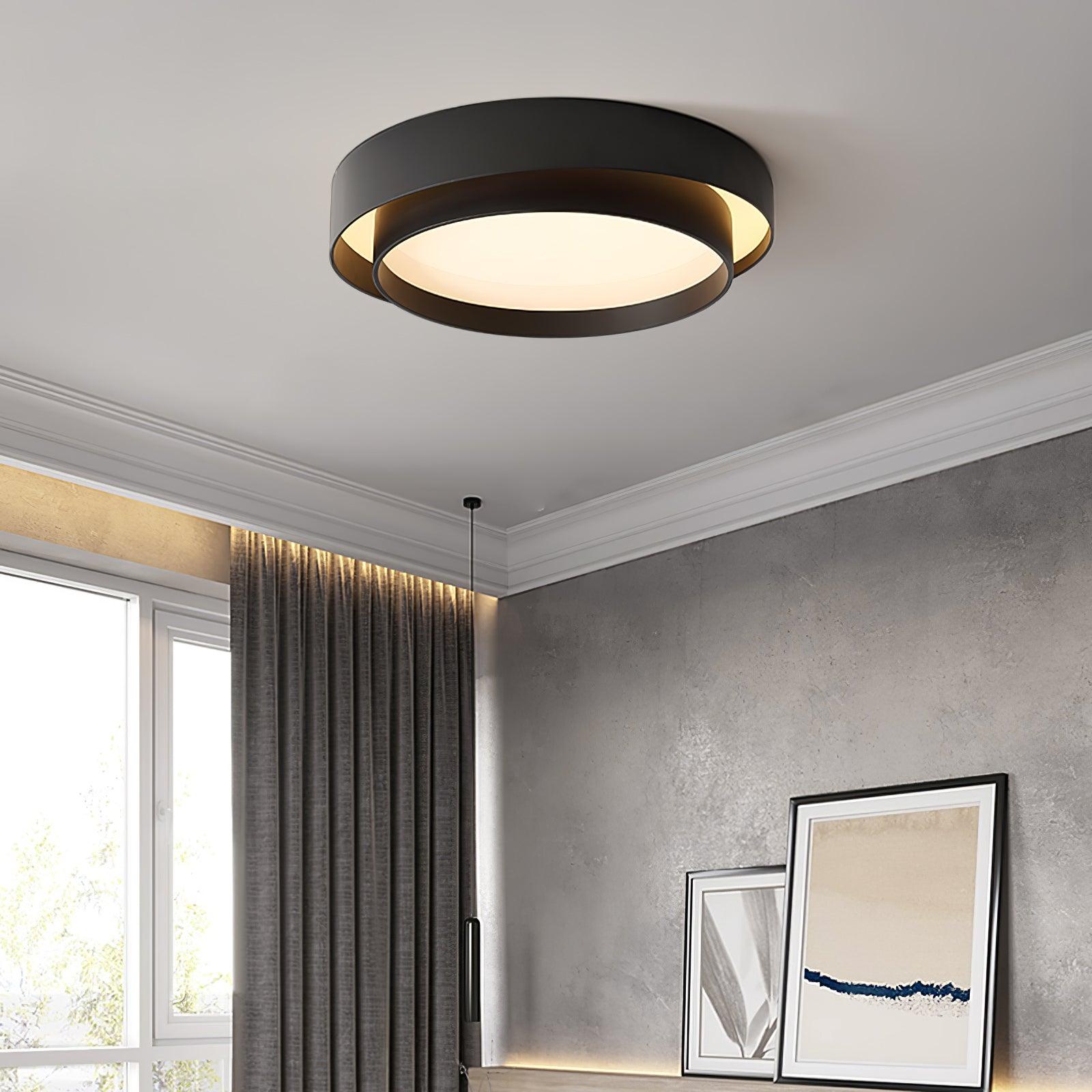 Modern wlip black double-ring LED flush mount ceiling light providing bright, anti-glare illumination in a contemporary living room