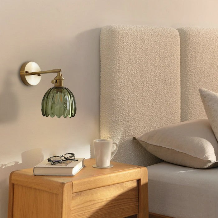 Green xetyl lotus glass wall light styled as a beautiful bedside reading lamp in a modern bedroom