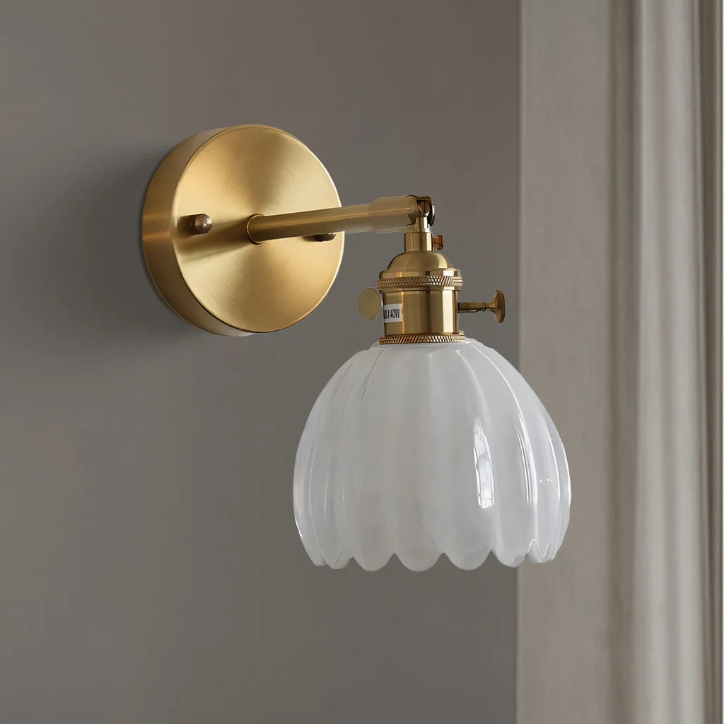 White opaque xetyl lotus glass wall light offering a clean, soft, mid-century aesthetic