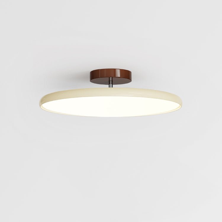 Modern beige adjustable LED flush mount xome ceiling light showcasing its sleek, low-profile design