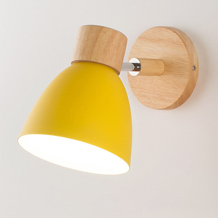 Yellow wood and metal dome sconce without a pull cord, isolated on a light background