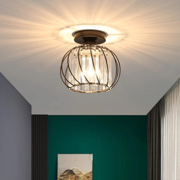 Black yilo mini crystal hallway chandelier illuminating a modern, colourful living space