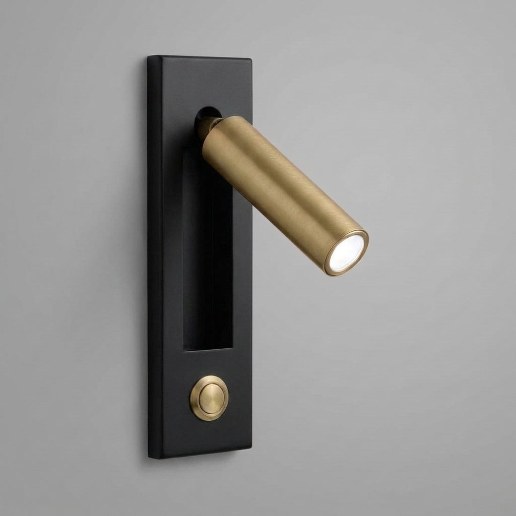 Zexto wall sconce in black finish showing the button switch, alternate angle on a grey background