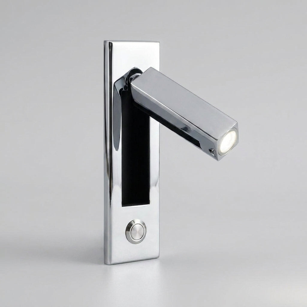 Zexto wall sconce in chrome finish showing the button switch, on a grey studio background