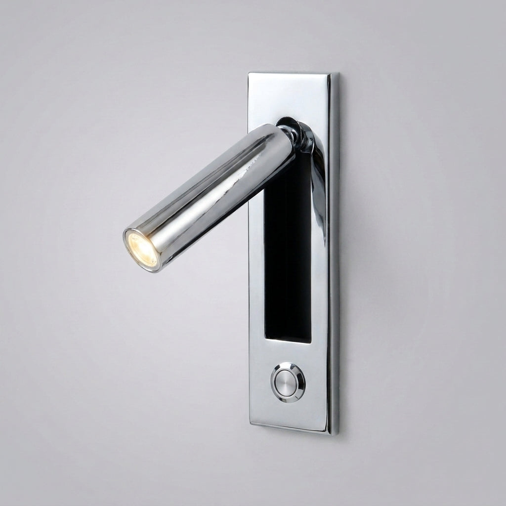 Zexto wall sconce in chrome finish showing the button switch, on a grey studio background