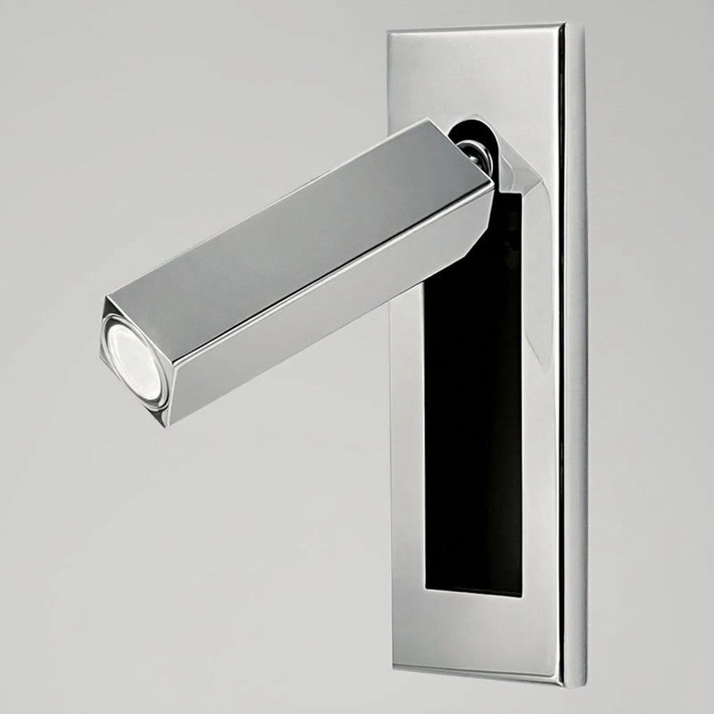 Zexto square wall sconce in chrome finish on a grey studio studio background