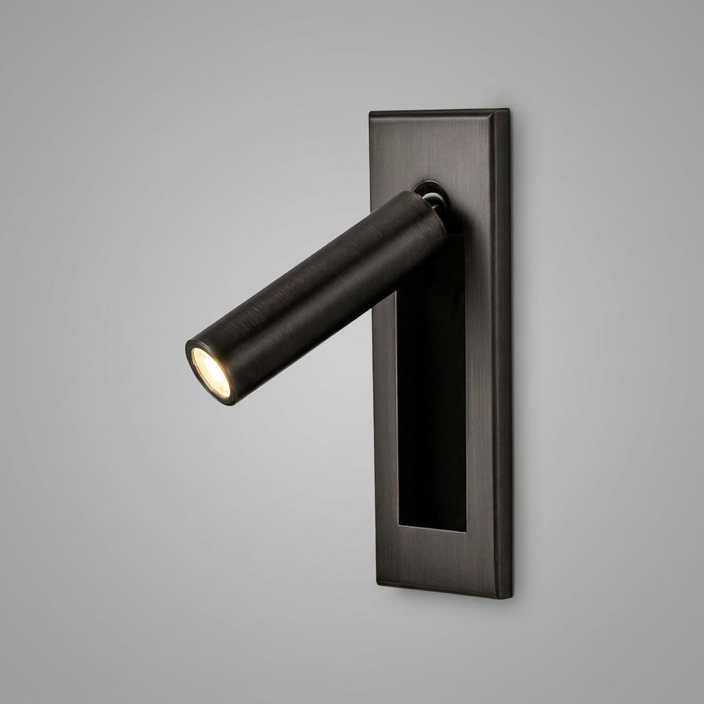 Zexto adjustable black wall sconce with rotatable cylinder spotlight head, lit