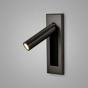 Zexto adjustable black wall sconce with rotatable cylinder spotlight head, lit