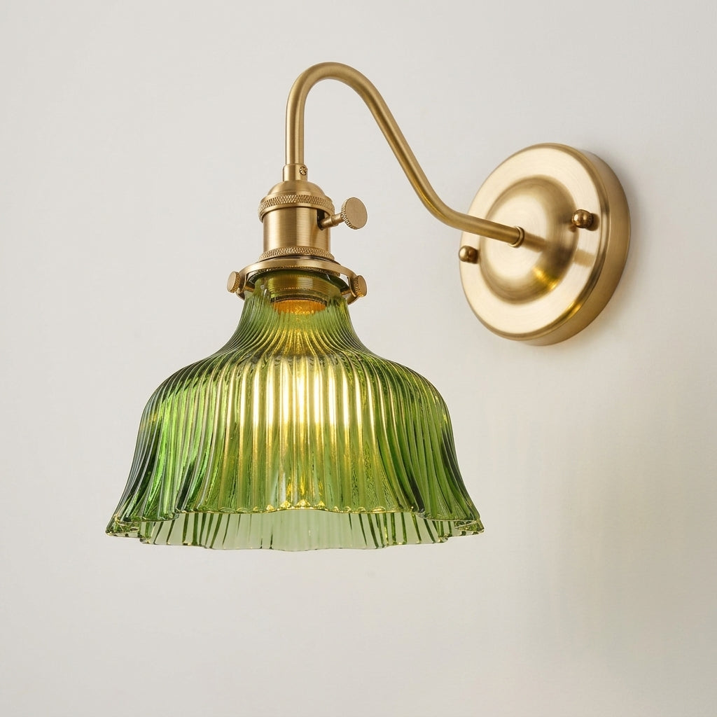 Zuvqa wall sconce with green glass shade, angled studio view on neutral background